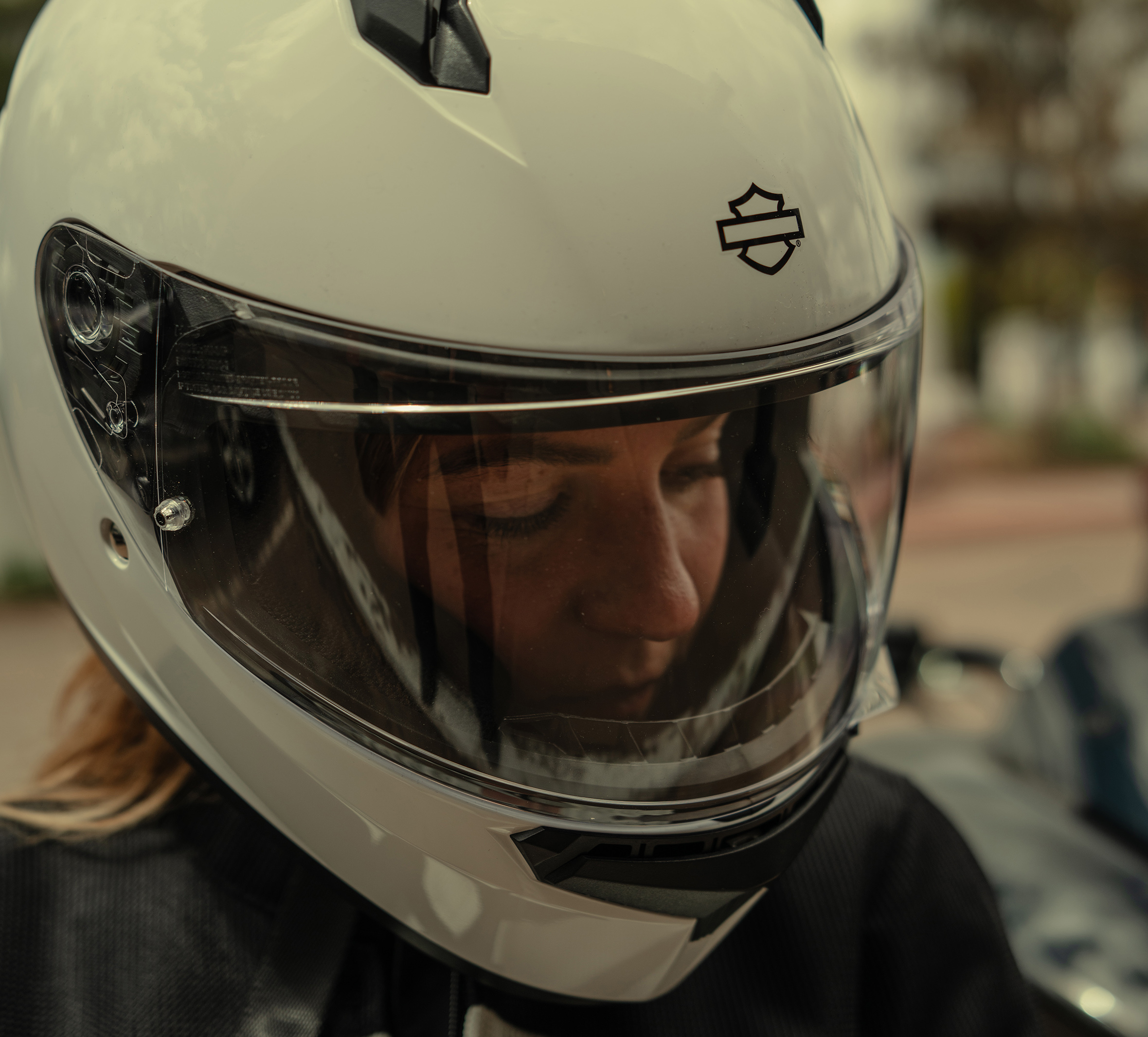 woman wearing H-D Velo H34 Full Face Helmet